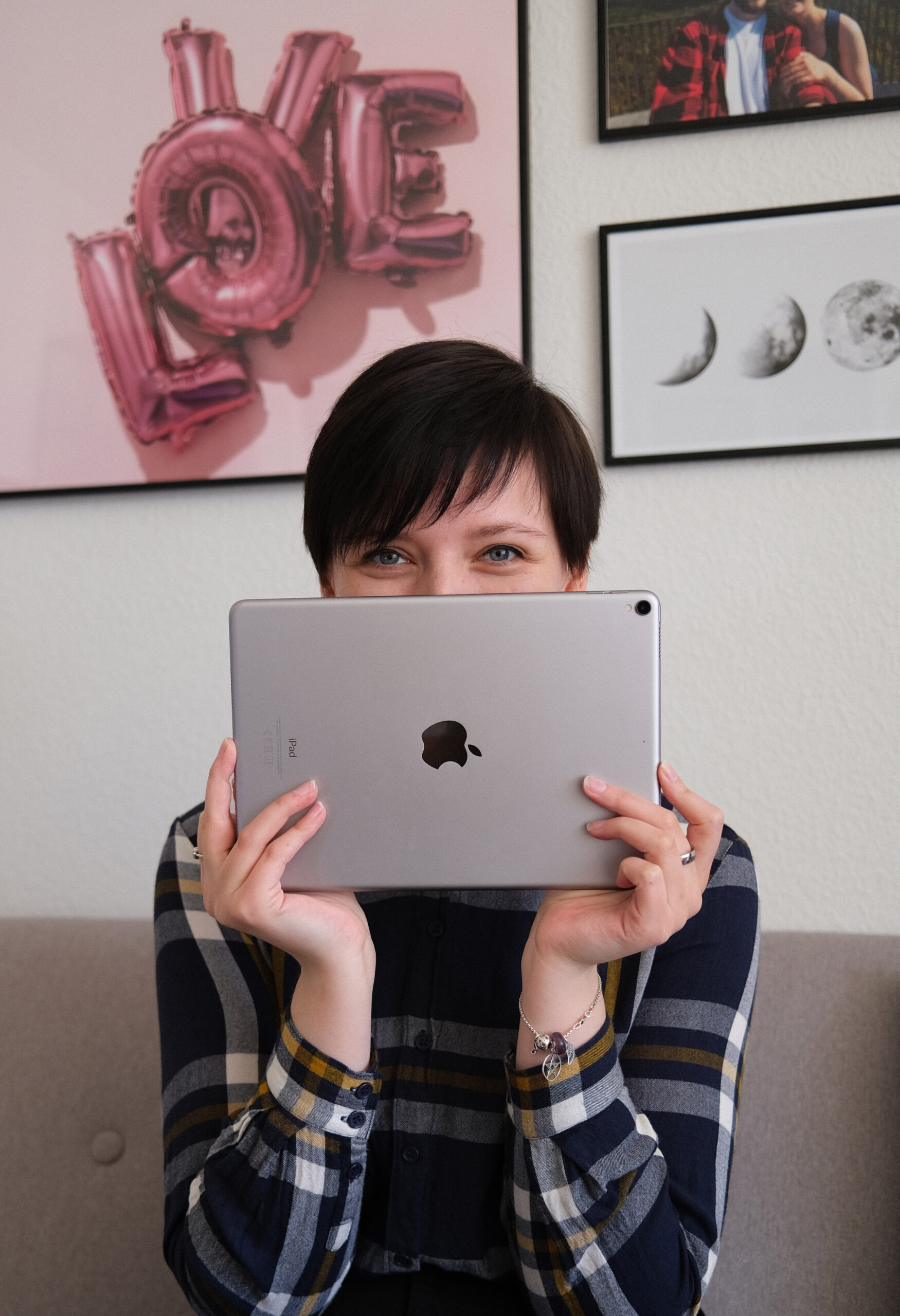 Photo of Sofie Tornemark sitting with an iPad